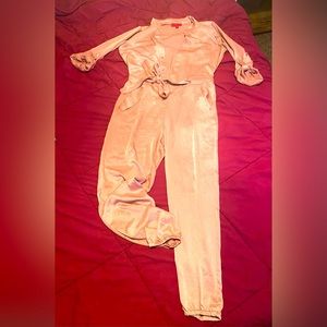 Mauve colored Jennifer Lopez Jumpsuit. Medium size. True to size